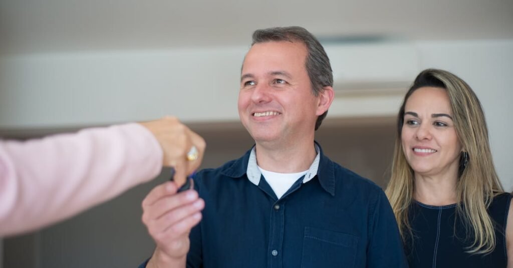 First-time buyers receiving keys to their new UK home