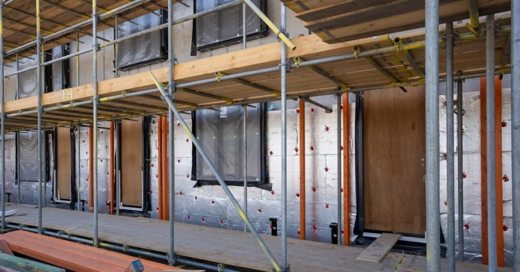 Fixer-upper property with renovation scaffolding