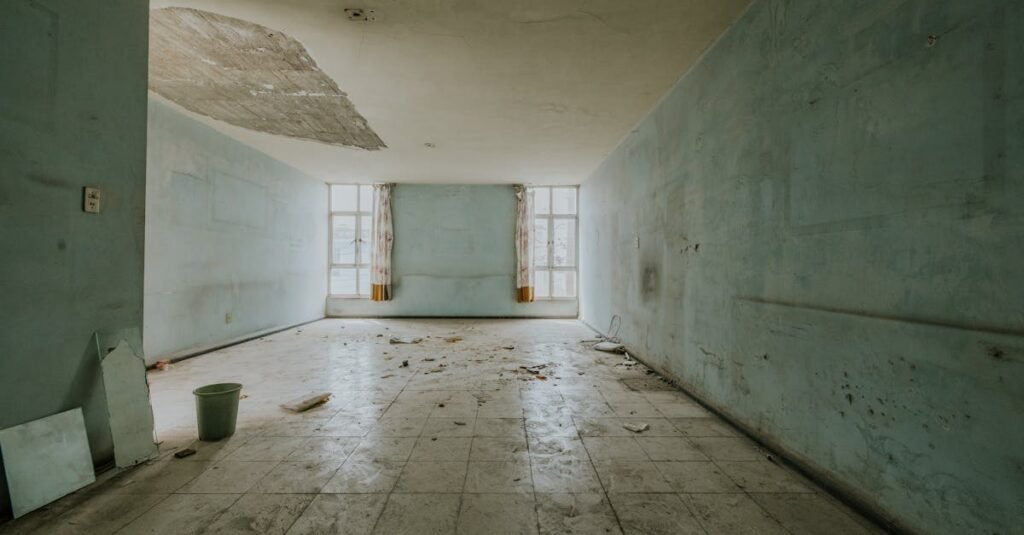 Mould and damp damage on wall and ceiling