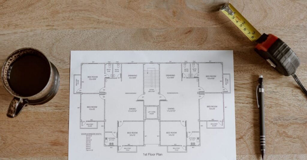 Measuring tape on a property floor plan