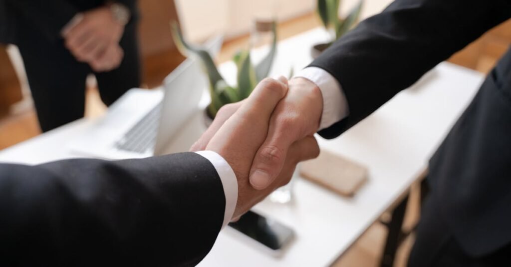 Handshake after a successful property price negotiation