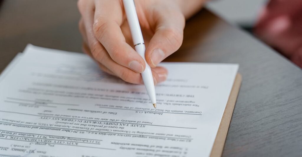 Signing a tenancy agreement document