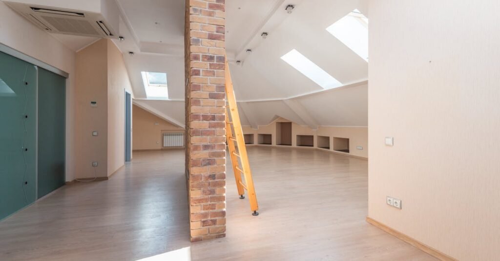 Loft insulation being installed for energy efficiency
